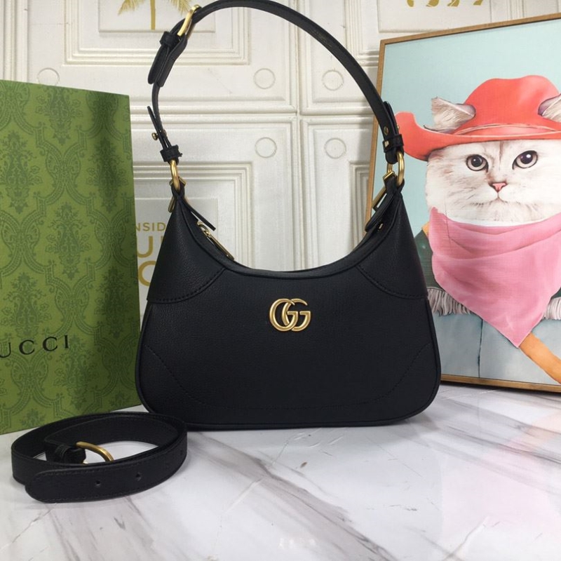G*u*i top handle bags